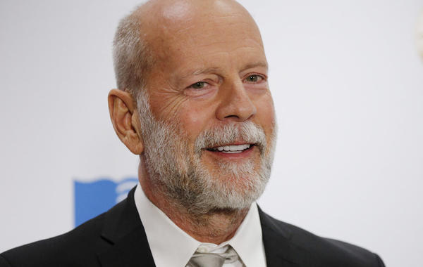 photo taken on November 15, 2017 US actor Bruce Willis arrives for the Library of Congress Gershwin Prize Honoree’s Tribute Concert in Washington, DC. DOMINICK REUTER / AFP