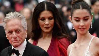 Michael Douglas arrives with his wife British actress Catherine Zeta-Jones (C) and daughter Carys for the opening ceremony and the screening of the film "Jeanne du Barry" during the 76th edition of the Cannes Film Festival in Cannes, southern France, on May 16, 2023. (Photo by LOIC VENANCE / AFP)