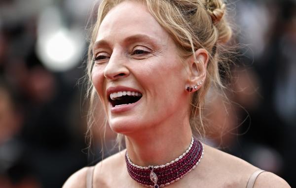 US actress Uma Thurman arrives for the opening ceremony and the screening of the film "Jeanne du Barry" during the 76th edition of the Cannes Film Festival in Cannes, southern France, on May 16, 2023. (Photo by LOIC VENANCE / AFP)