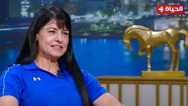 المرأة الحديدية.. حكاية صاحبة الـ 60 عاما الفائزة بلقب بطلة العالم