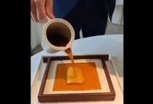 طعام فاخر.. طهي السمك باستخدام شمع العسل الساخن...