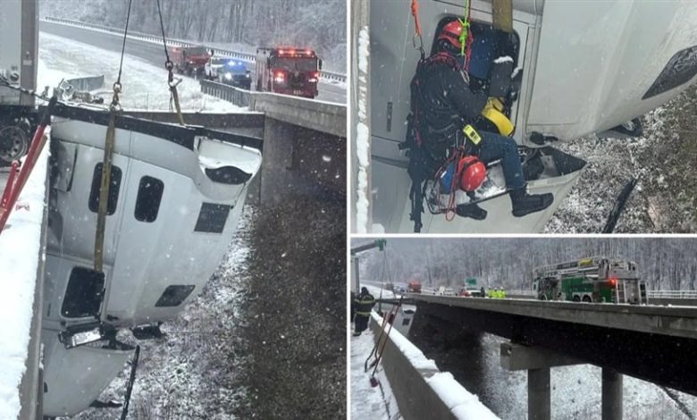 شاهد| إنقاذ سائق تدلت شاحنته فوق جسر معلق