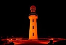 فنار دمياط يضيء باللون البرتقالي دعمًا للمرأة ضد العنف